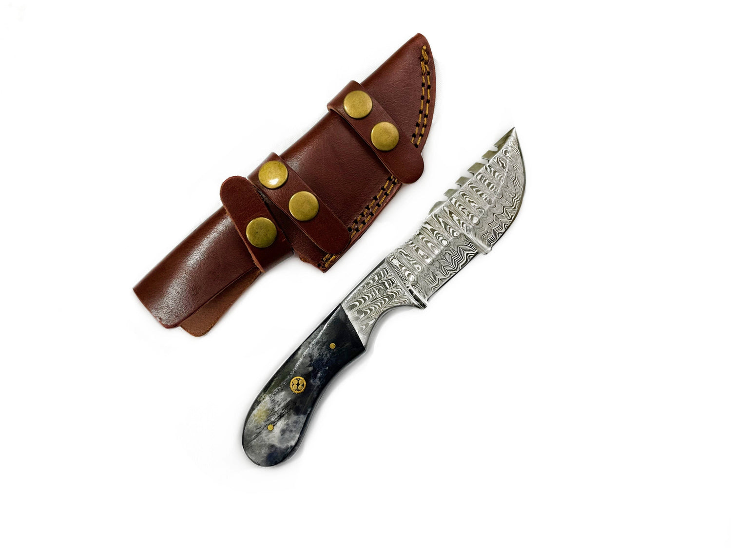 Decorative knife with a brown leather sheath on a white background