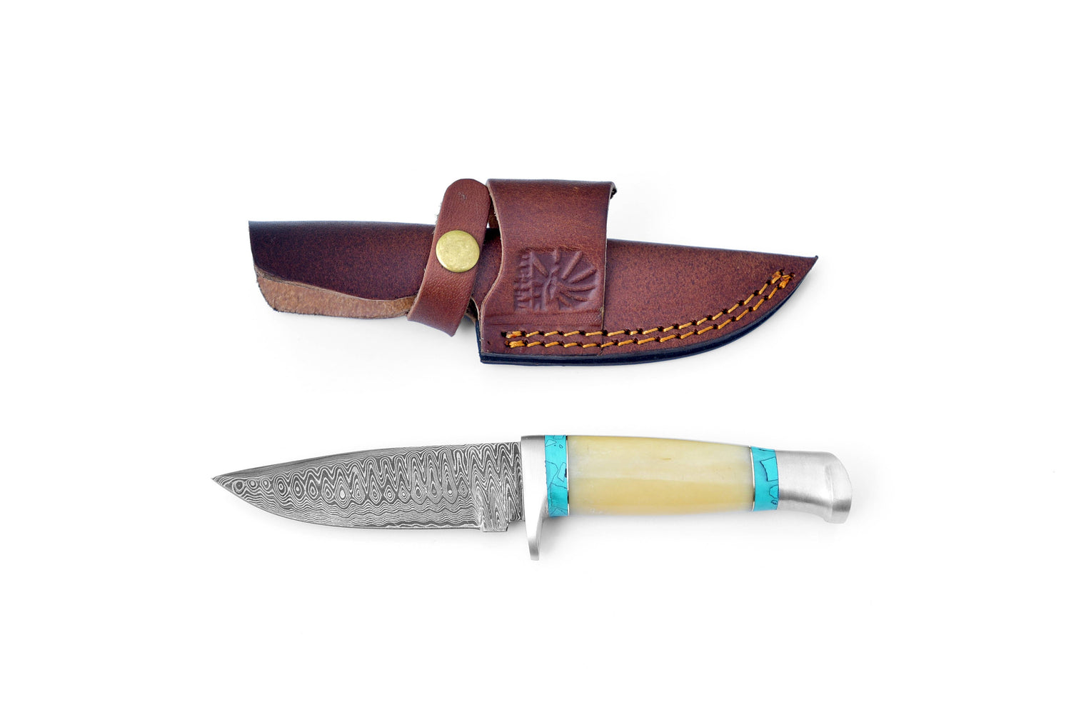 Knife with a decorative handle and leather sheath on a white background