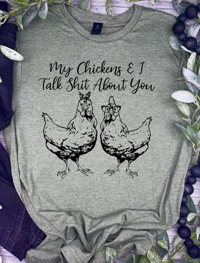 Gray t-shirt with chicken graphic and text 'My Chickens & I Talk Shit About You' on a decorative background.