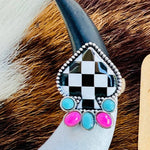 Decorative hair clip with colorful beads on a brown fur background, featuring 'Ranchy Roan Boutique' label.