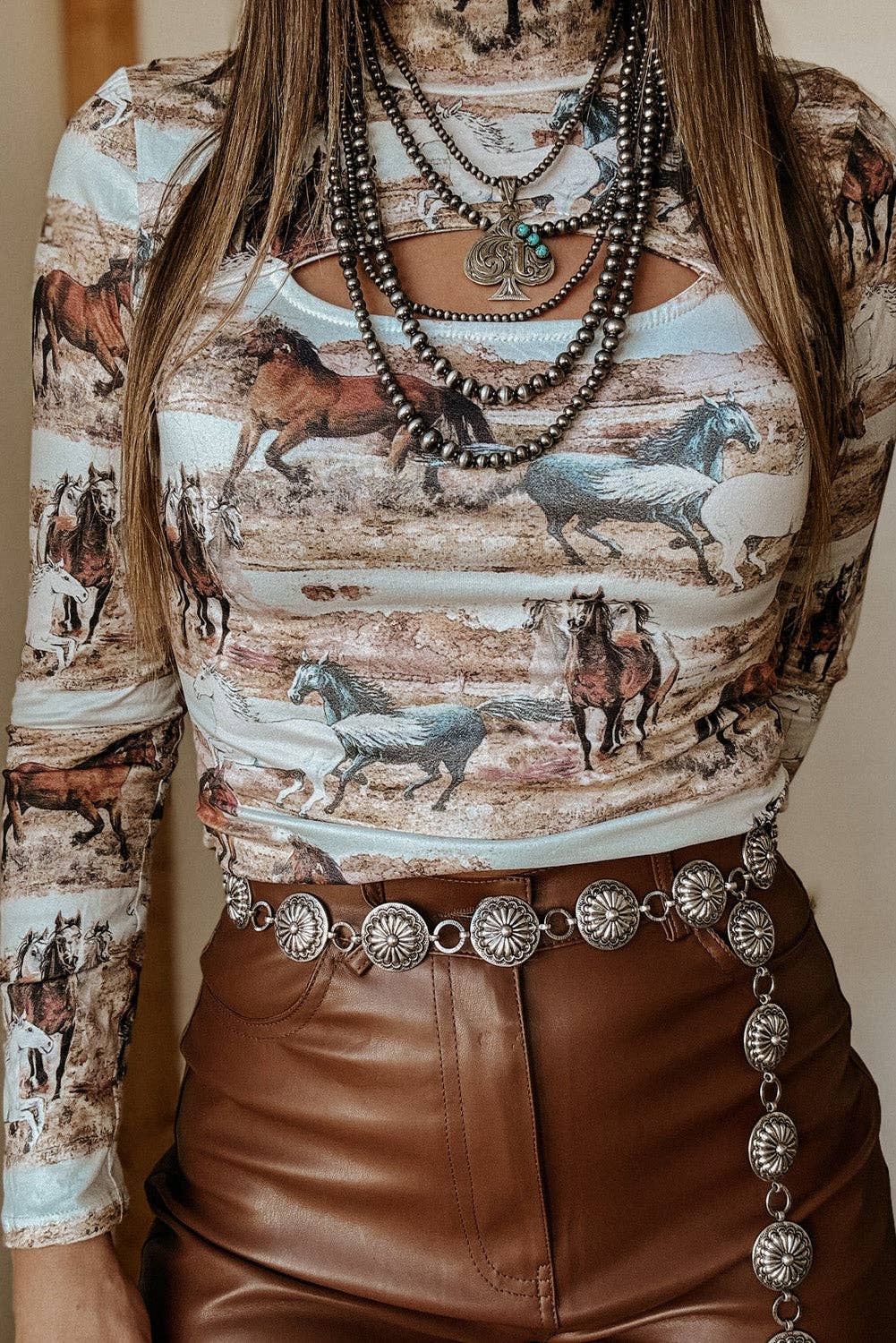 Close up of Western Cut Out Turtleneck Top