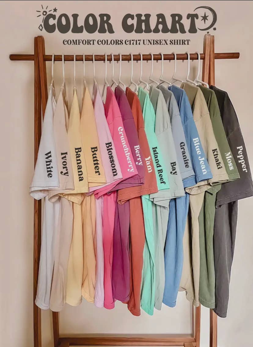 Color chart with various shirts on hangers against a plain background