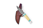 Knife with a wooden handle and leather sheath on a white background