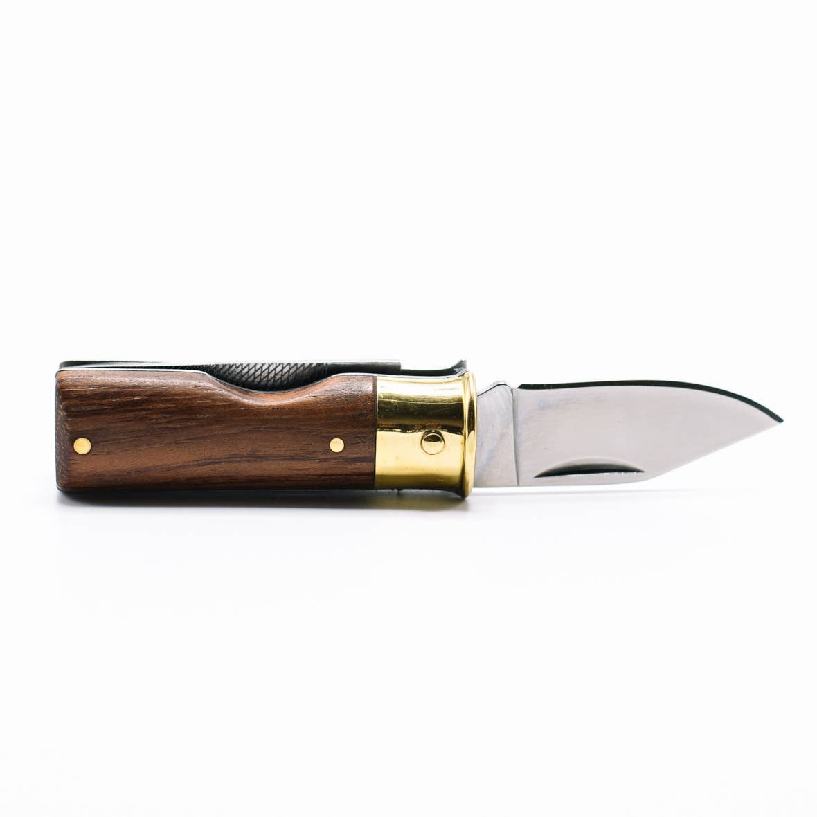 Foldable knife with wooden handle and brass accent on a white background