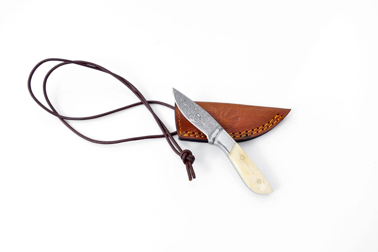 Knife with a leather sheath on a white background