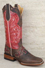 Brown and red cowboy boot on a textured gray background